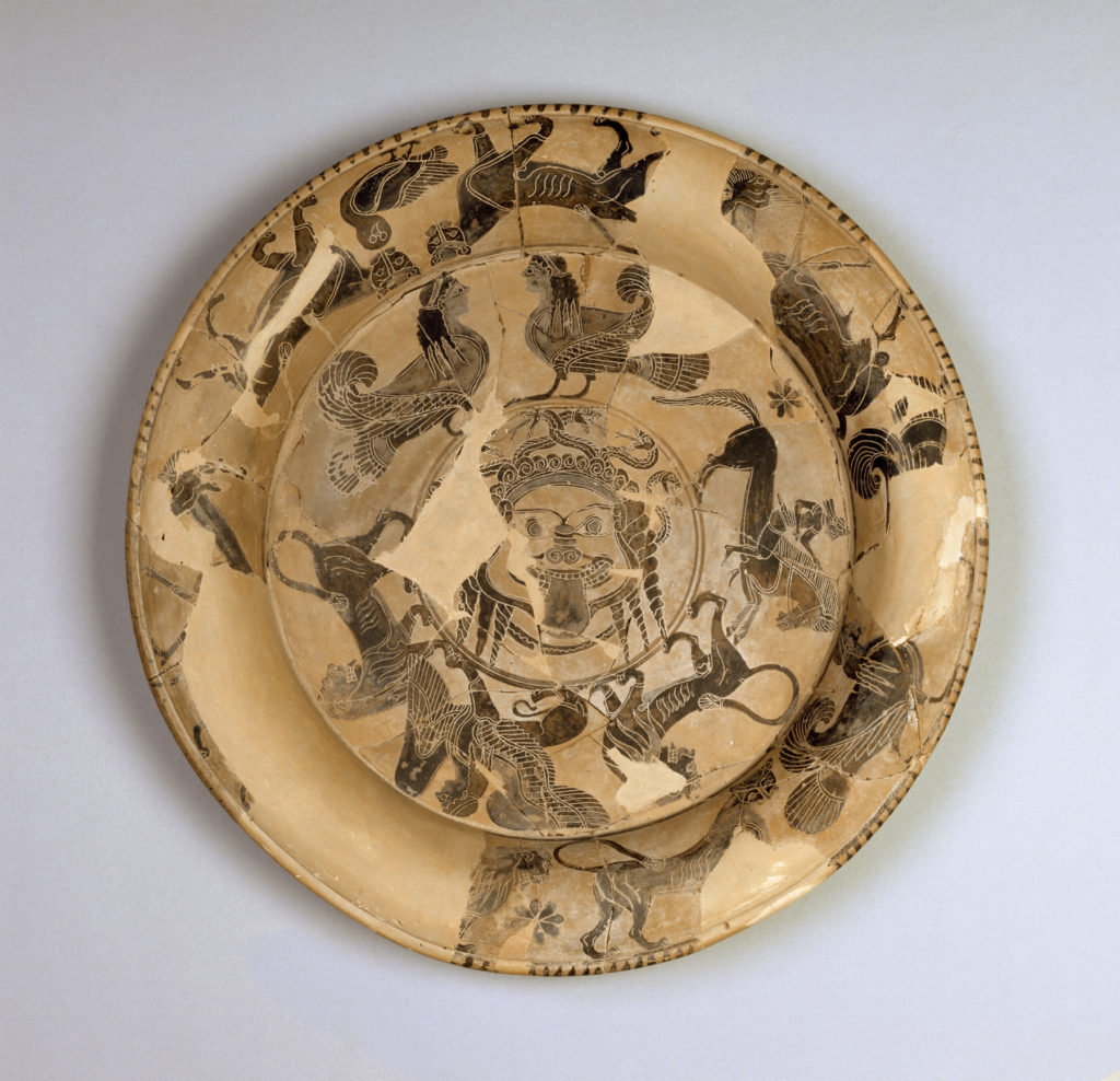 Plate with Medusa in center surrounded by sphinxes, sirens, and  animals.  Greece, 660 B.C.E. Source: Walters Art Museum.